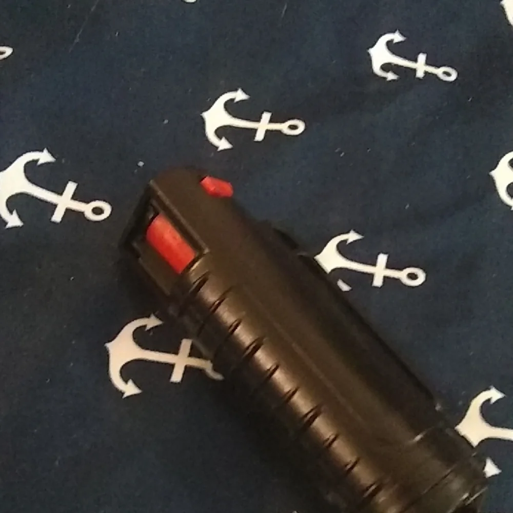 Black Pepper Spray with Red Trigger